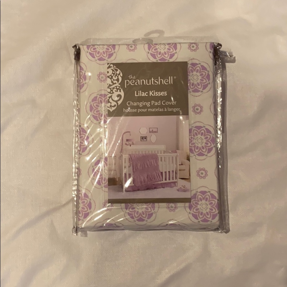 The Peanutshell Lilac Kisses changing pad cover.
